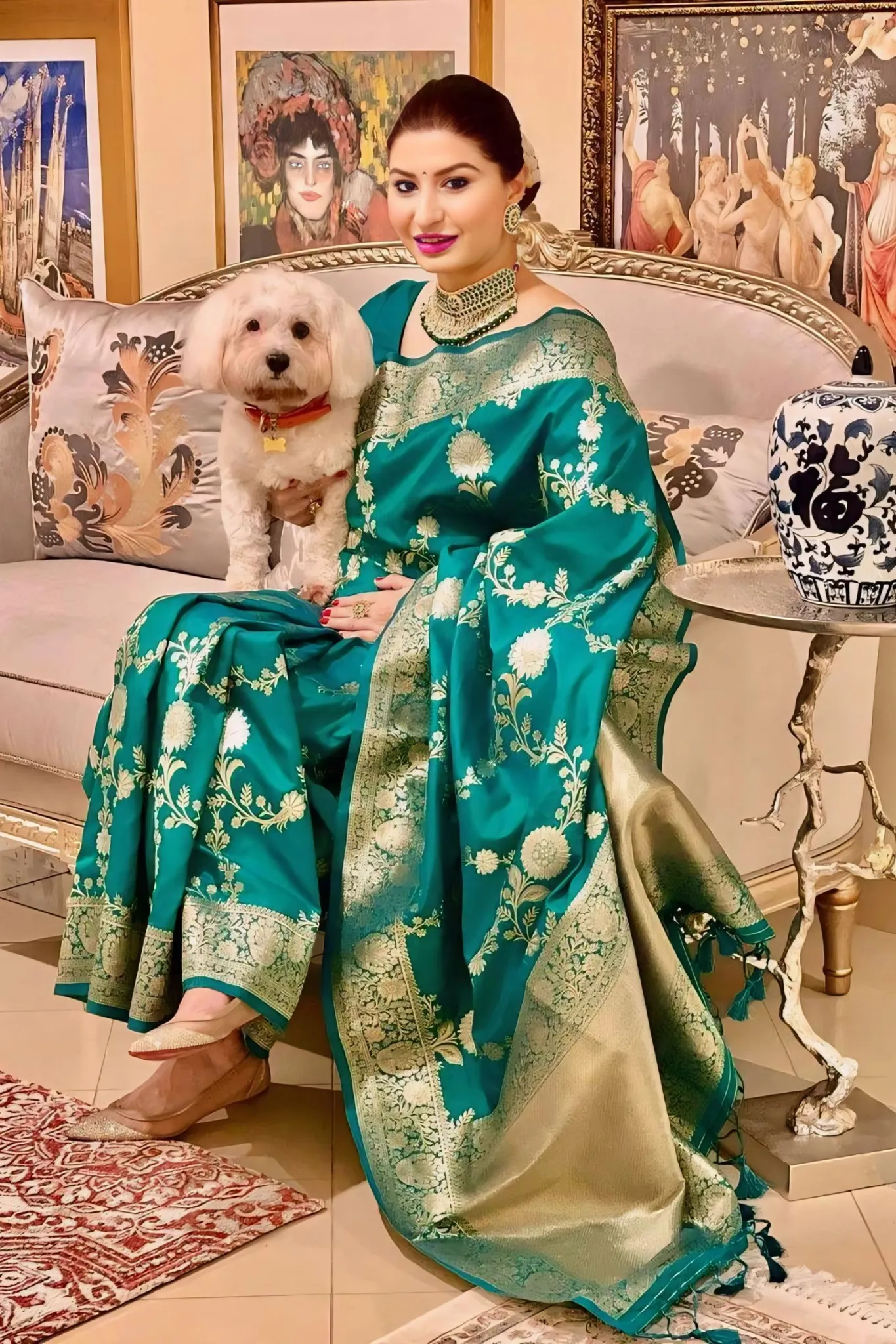 A REGAL BANAEASI SILK SAREE WITH INTRICATE GOLDEN ZARI WORK
