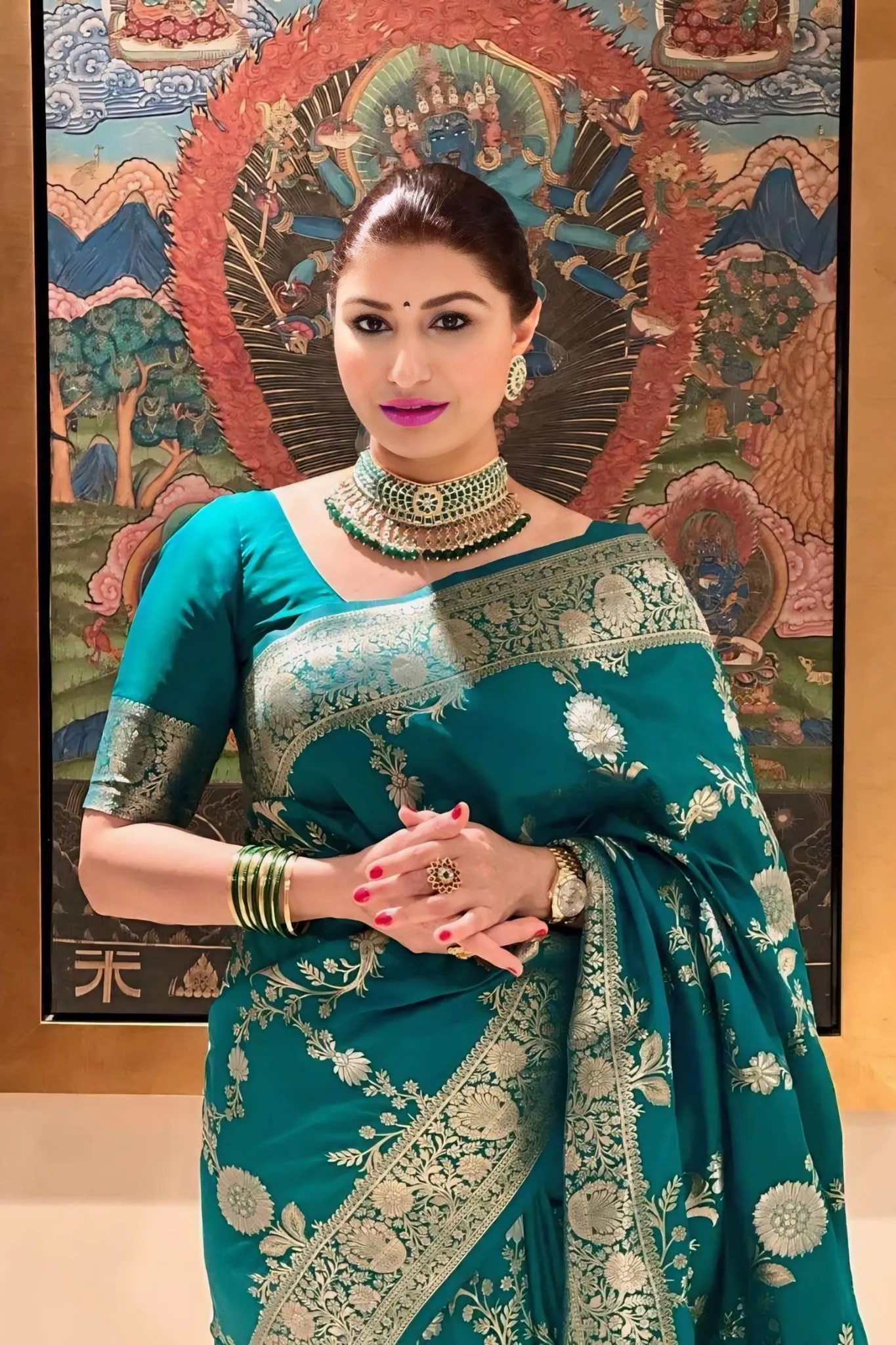 A REGAL BANAEASI SILK SAREE WITH INTRICATE GOLDEN ZARI WORK